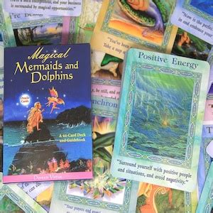 Let the mystical mermaids and dolphins guide your path with this divination deck
